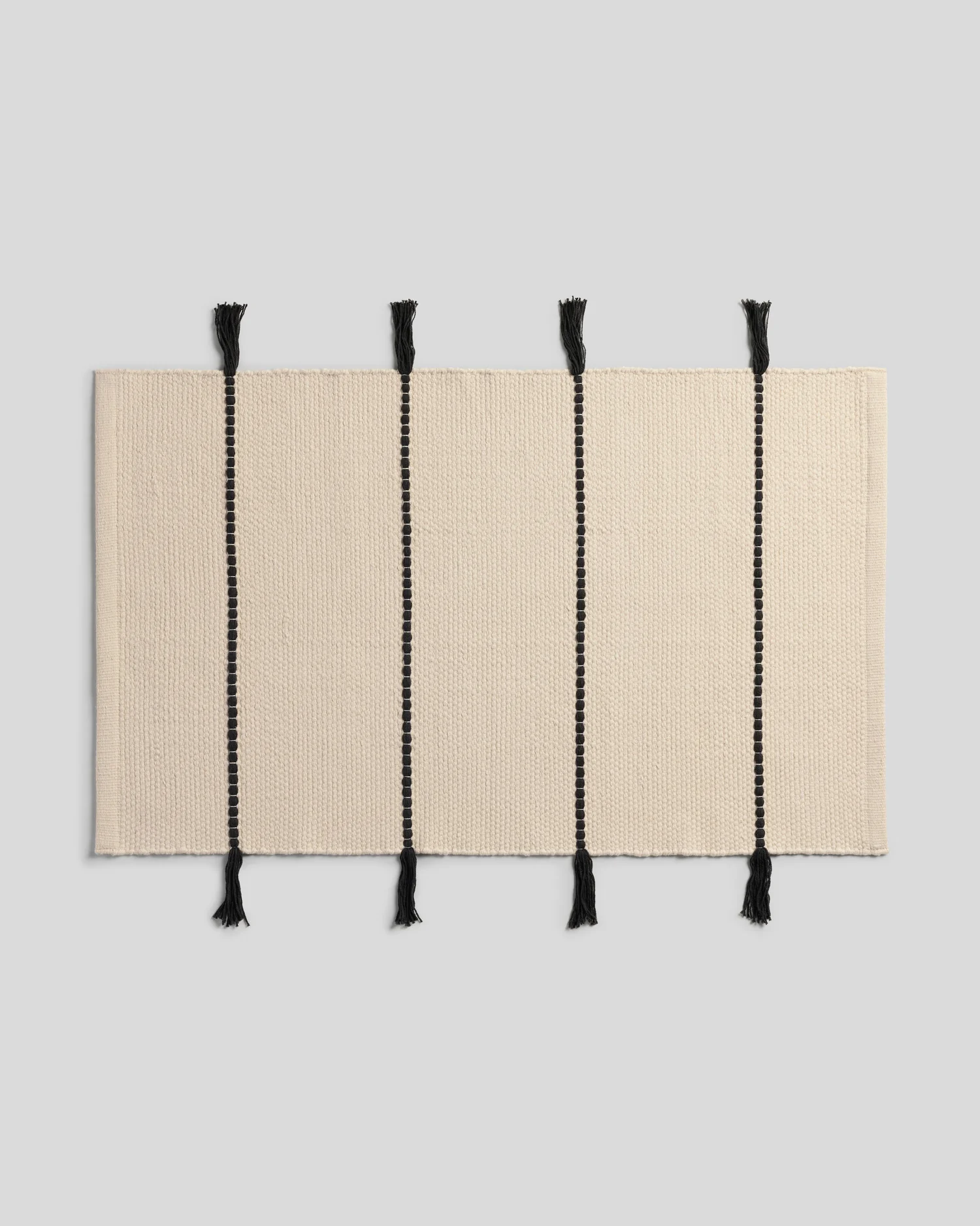 Organic Tassel Bath Rug (Natural and Onyx)